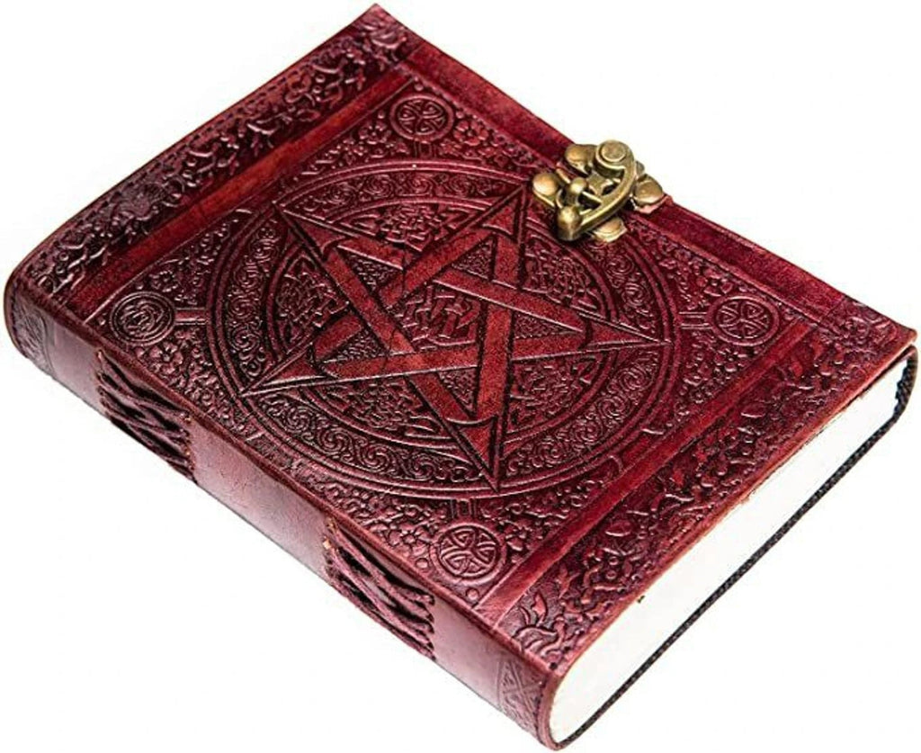 Retkatha handcrafted reddish-brown leather journal with embossed star, Celtic knotwork, and vintage brass metal clasp.