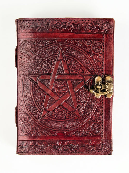Retkatha handcrafted reddish-brown leather journal with embossed Celtic star and vintage brass metal clasp.