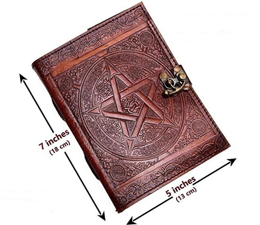 Retkatha handcrafted brown leather journal with embossed star and Celtic knotwork, featuring a vintage brass clasp.