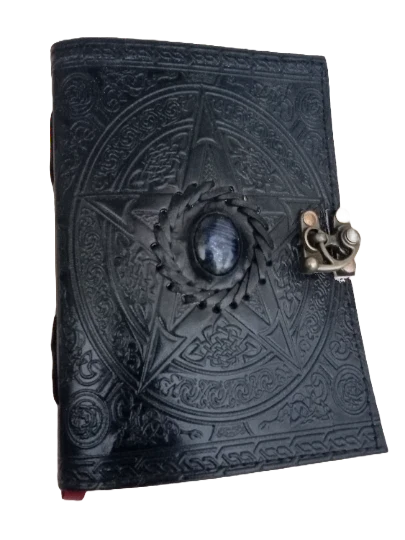 Retkatha handcrafted black leather journal with embossed pentagram, blue gemstone, and antique brass clasp lock.