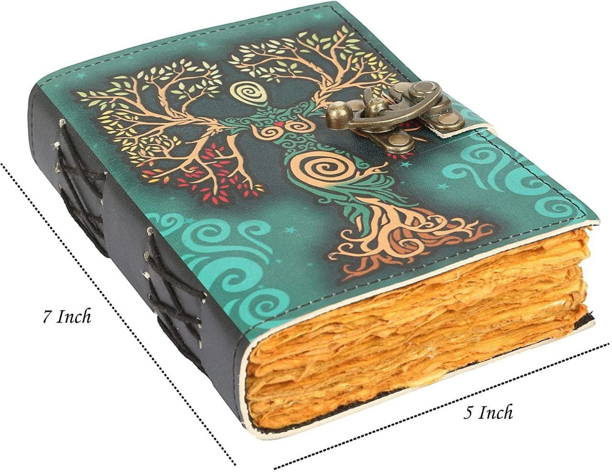 Retkatha handcrafted leather journal with Tree of Life motif, antique brass clasp, and vintage deckle edge paper.