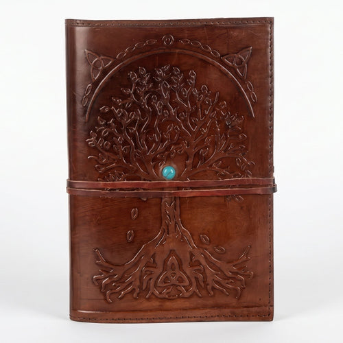 Retkatha cognac brown buffalo leather journal with embossed Tree of Life, Celtic knotwork, and turquoise stone clasp.